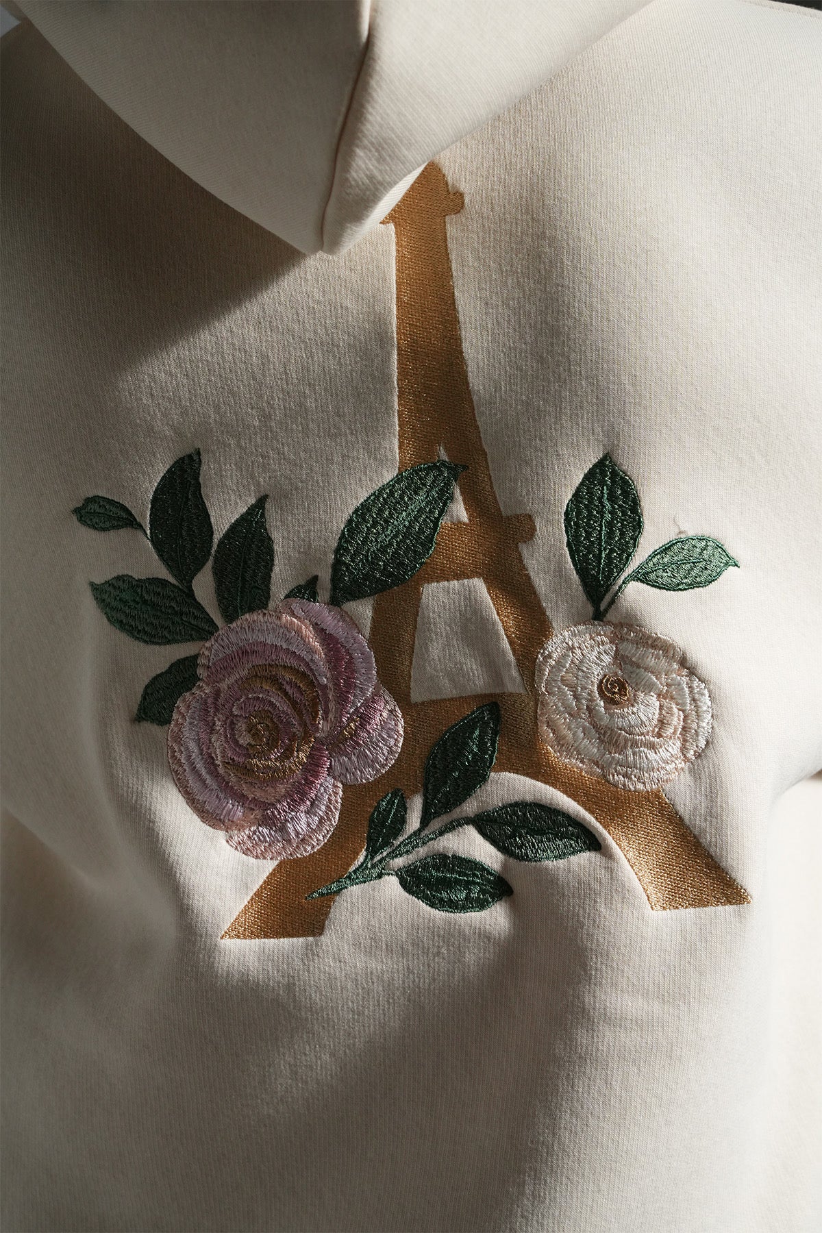 SWEAT A CAPUCHE A MOTIF